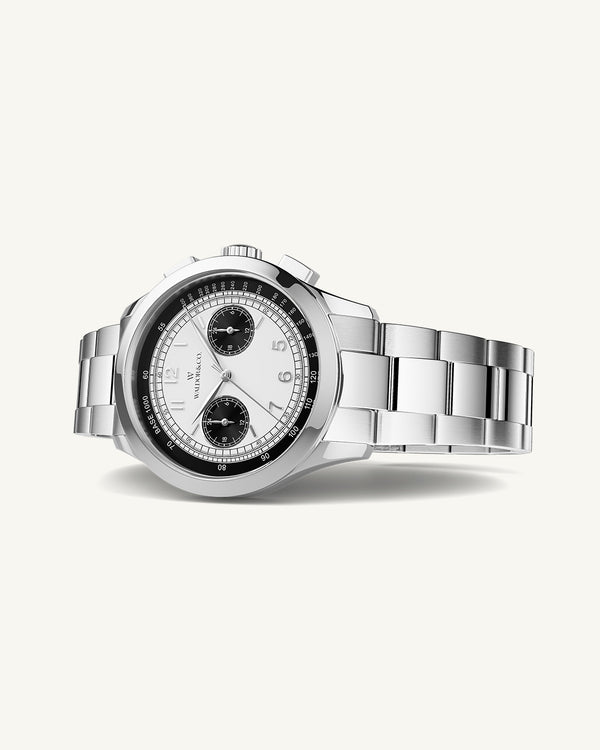 A round mens watch in rhodium-plated silver from Waldor & Co. with black and white sunray dial and a second hand. Seiko movement. The model is Chrono 39 Panda Ltd. Edition