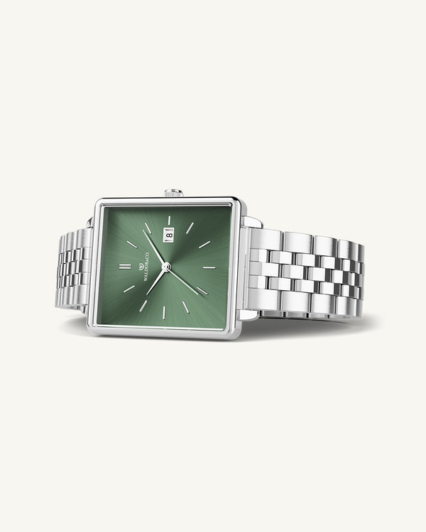 A square womens watch in silver from WALDOR & CO. with green sunray dial and a second hand. The model is Delight 32 Chelsea 28x32mm