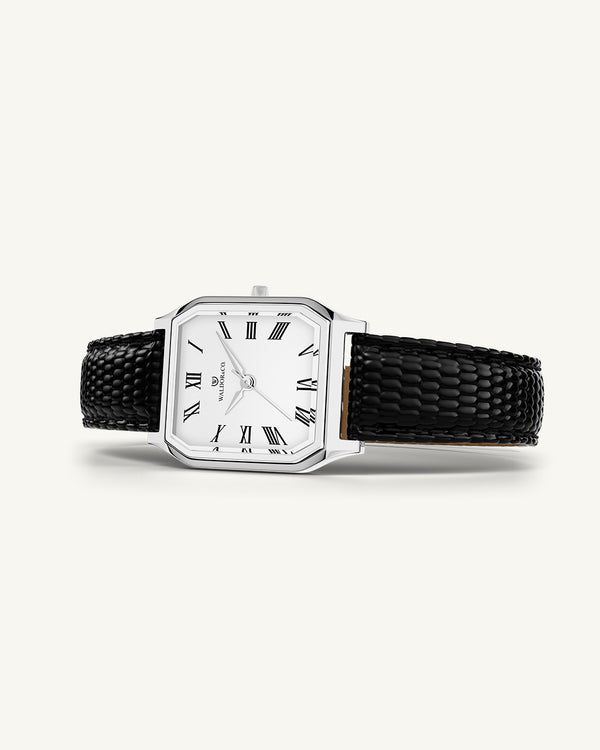 A square womens watch in Rhodium-plated 316L stainless steel from Waldor & Co. with white Diamond Cut Sapphire Crystal glass dial. Strap in black Genuine leather. Seiko movement. The model is Eternal 22 Varenna.'